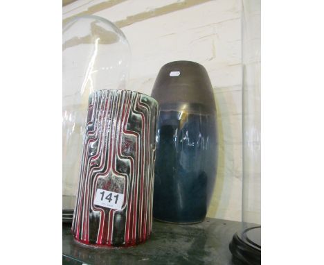 A Poole Pottery ?vase blue and grey glaze and another Poole vase red line design