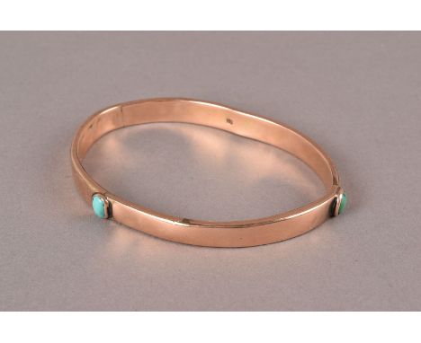 A late Victorian 9ct gold and turquoise bangle, the now mishaphen oval band set with three light green stones, approx 17g, AF