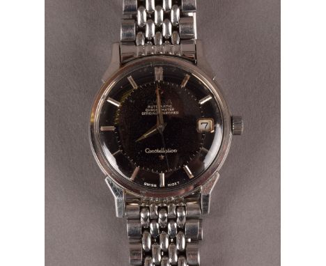 A 1960s Omega Automatic Chronometer Constellation stainless steel gentleman’s wristwatch, having black dial with baton numera