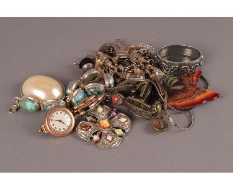 A good collection of gold, silver and other costume jewellery and watches, including a heavy silver and white metal charm bra