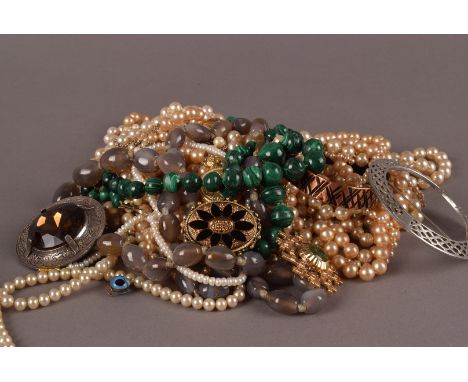 A collection of costume jewellery, including several pairs of earrings such as pearl examples, a malechite bead necklace, a M