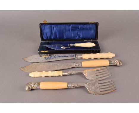 A cased early Victorian silver and ivory cake trowel by TP & S, together with two pairs of Victorian ivory handled fish serve