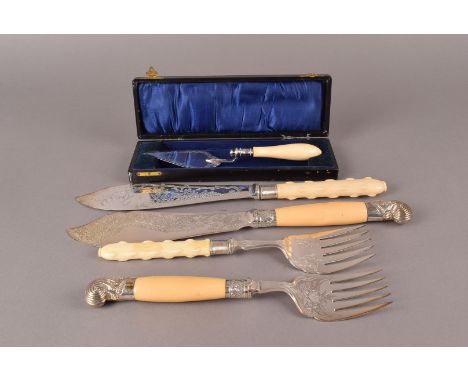 A cased early Victorian silver and ivory cake trowel by TP & S, together with two pairs of Victorian ivory handled fish serve