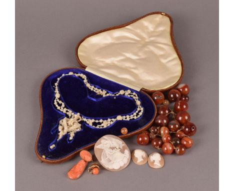 A Victorian seed pearl necklace in fitted box, AF, together with an unstrung hardstone bead necklace, a pair of carved shell 