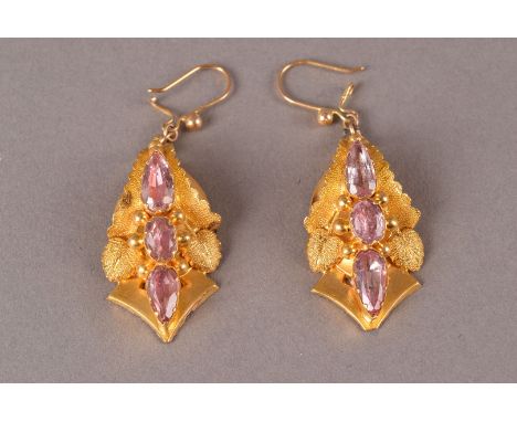 A pair of vintage pinchbeck and paste set earrings, with three pink stones and leaves, on loop fittings, possibly repaired to
