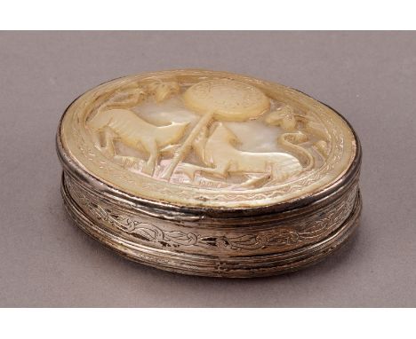 A 19th century continental silver and MOP snuff box, the oval MOP panels on the base and top with carved scenes of two animal