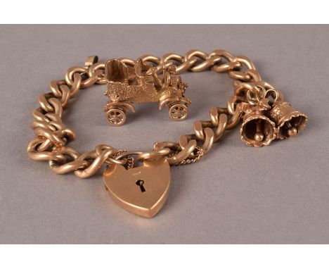 A 1960s 9ct gold bracelet, flattened curb links united by a heart shaped padlock and supporting a pair of bells charm, togeth