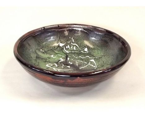 TREVOR CORSER.
A large Leach Pottery fish-decorated bowl by Trevor Corser. Impressed personal & Pottery marks. Diameter 29cm.