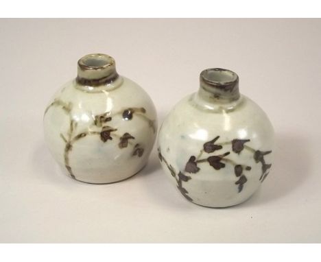 LEACH POTTERY.
Two similar Leach Pottery small porcelain vases with 'bamboo' decoration. Pottery mark. Height 8cm. Possibly b