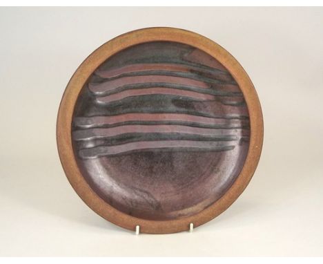 LEACH POTTERY.
A Leach Pottery large shallow, sgrafitto decorated dish. Unmarked. Diameter 30cm.