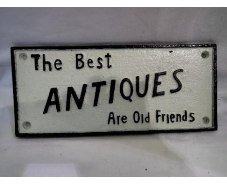 Cast iron The Best Antiques Are Old Friends sign, W: 25 cm. UK P&amp;P Group 2 (£20+VAT for the first lot and £4+VAT for subs