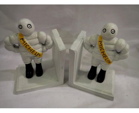 Pair of cast iron Michelin Man book ends. UK P&amp;P Group 2 (£20+VAT for the first lot and £4+VAT for subsequent lots) 