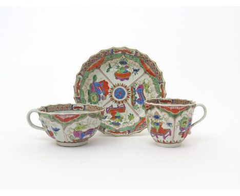 A Worcester trio  c.1770, the Warmstry fluted bodies richly enamelled with the Dragons in Compartments pattern, the interiors