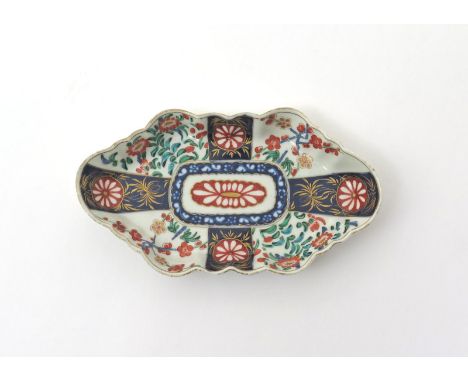 A rare Worcester hexagonal spoon tray  c.1765, the elongated form brightly enamelled with a Japan pattern of Kakiemon floral 