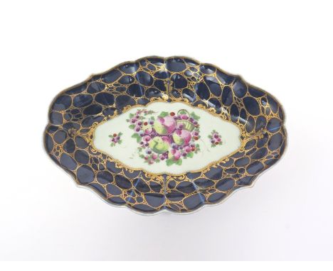 A Worcester dessert dish  c.1770, of steep-sided oval form, the well painted with an arrangement of Spotted Fruit within a wi