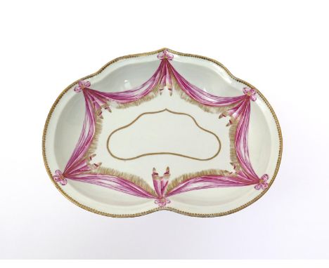 A Worcester dessert dish  c.1785, decorated in the manner of the Stormont service with swags of puce drapery suspended from b