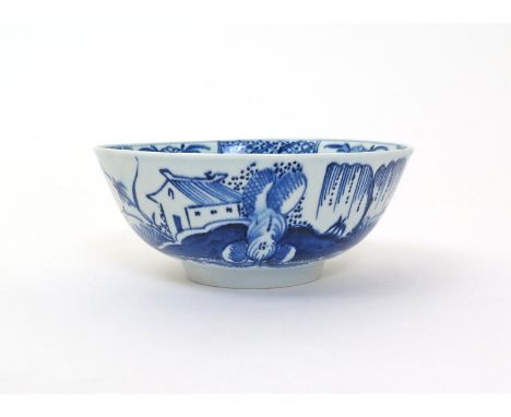 A Bow blue and white bowl  c.1770, painted with a small dwelling in an Oriental landscape with weeping willow and flocks of b