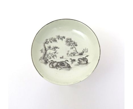 A Worcester ornithological saucer  c.1758-60, printed in black with River Scene, with swans and other aquatic birds swimming 
