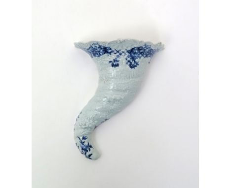 A Worcester blue and white moulded cornucopia wall pocket  c.1758, the traditional spiral horn shape additionally moulded wit