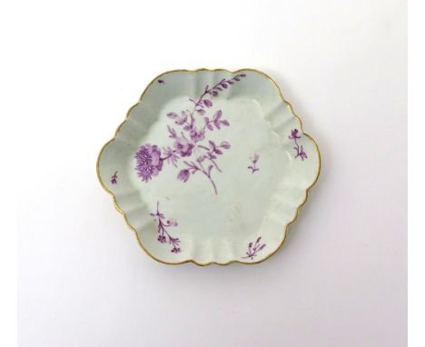 A Worcester teapot stand  c.1765, the hexagonal form painted in the Giles atelier with a simple flower spray in puce camaieu,