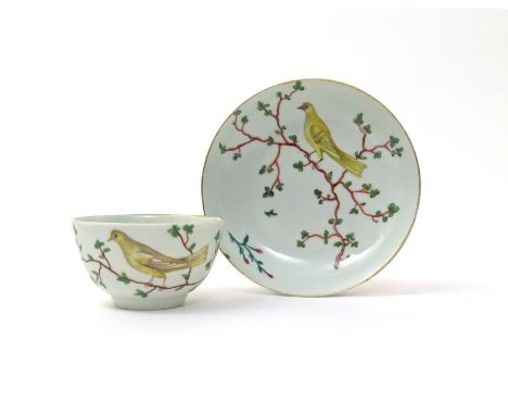 A rare Worcester teabowl and saucer  c.1765, painted in the Giles atelier with a yellow bird or canary perched on a spindly b