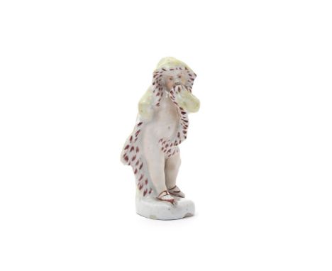 A rare Samuel Gilbody (Liverpool) figure of Winter  c.1756-60, modelled as a putto draped in a yellow cloak lined with ermine
