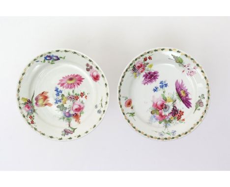 A pair of Swansea plates  c.1815-17, painted probably by Henry Morris with colourful floral posies and single scattered sprig