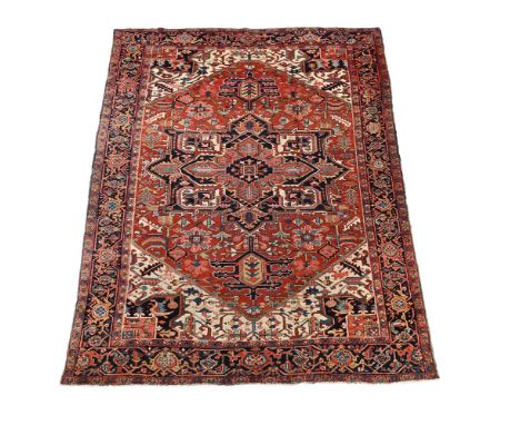 A HERIZ CARPET approximately 304 x 274cm  Condition Report:  Carpet with the wear overall consistent age and use, but general