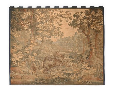 A CONTINENTAL VERDURE TAPESTRY  PROBABLY 17TH CENTURY  Depicting hunting dogs attacking a bear in a wooded landscape  247cm h