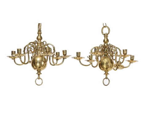 A PAIR OF BRASS SIX LIGHT CHANDELIERS IN DUTCH 17TH CENTURY STYLE, EARLY 19TH CENTURY each 46cm high, 49cm diameter overall 