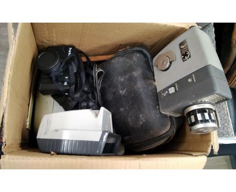 A box of mixed photographica including Zeiss Movilux projector and Elmo cine camera 