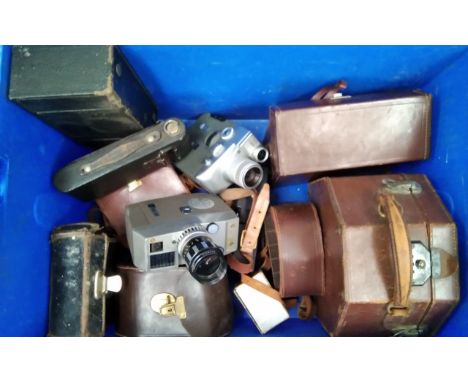 A box of photographic equipment including cine cameras and bellow camera etc 