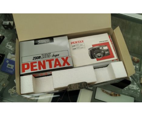 A Pentax Zoom 105 Super 35mm camera, boxed 