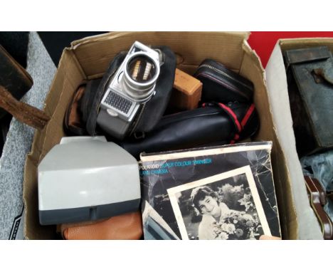 A box of mixed photographica including Polaroid Land Camera and U8 cine camera 