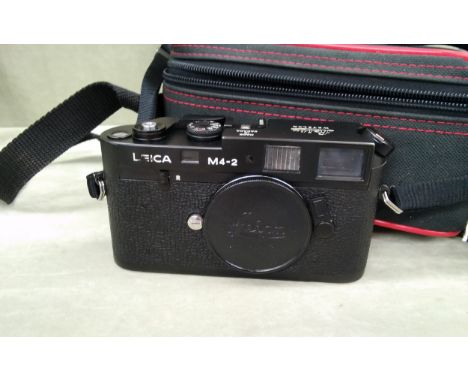 A Leitz Leica M4-2 rangefinder camera body, with unbranded carry case 