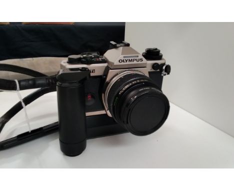 An Olympus OM-4 Ti SLR camera with 50mm lens 