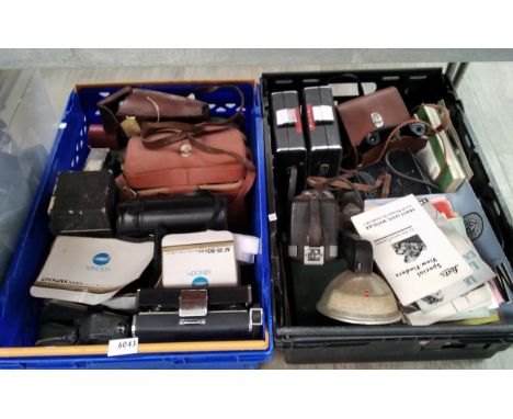 Two boxes of photographica including Minolta Dynax 7000i SLR and Zeiss lenses and camera backs etc 