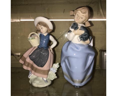 LLADRO FIGURINE 'SWEET SCENT' 5221 DATED 1983 AND A NAO FIGURINE 'NINA WITH PUPPY' DATED 1987