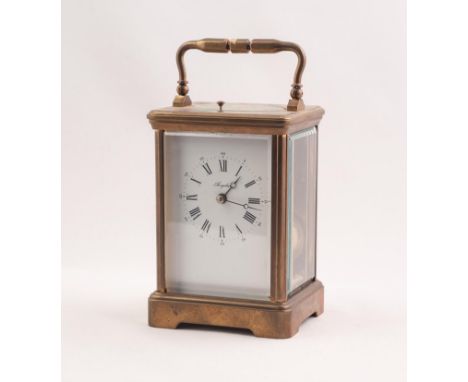 20th CENTURY FRENCH CORNICHE CASED BRASS REPEATER CARRIAGE CLOCK, the white enamel dial marked 'Angelus' with roman hour nume