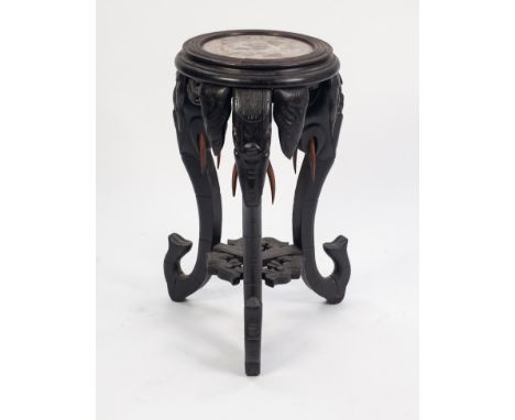 NEAR EASTERN CARVED BLACK WOOD AND MARBLE JARDINIERE STAND, the moulded circular top with red veined marble insert, raised on