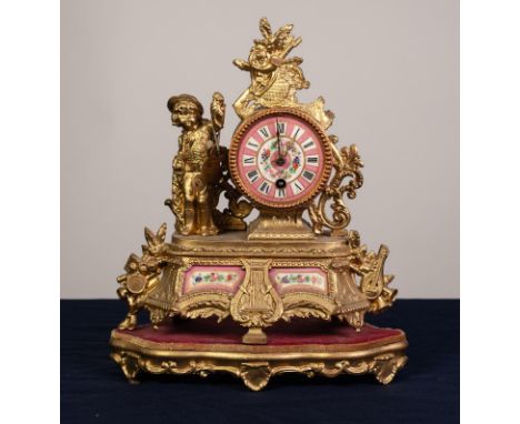 FRENCH, EARLY 20th CENTURY GILT SPELTER FIGURAL MANTEL CLOCK with drum shaped movement having pink and floral painted roman d