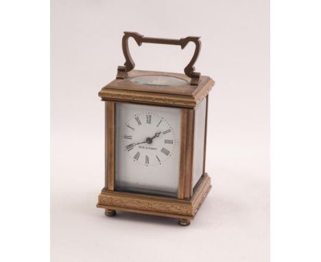 TINY 20th CENTURY FRENCH CORNICHE CASED BRASS CARRIAGE CLOCK, the white enamel dial marked 'Made in France' with roman hour n