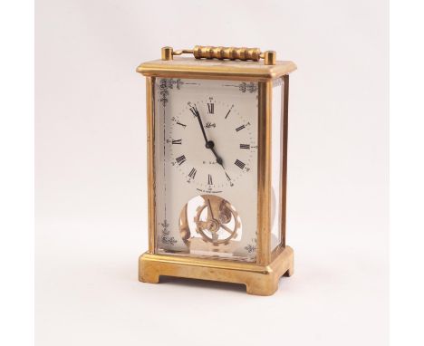 LATE 20th CENTURY 'MADE IN WEST GERMANY' CORNICHE CASED BRASS CARRIAGE CLOCK, the dial with visible escapement marked 'Schatz