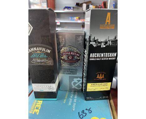a bottle of Auchentoshan scotch whisky, Tamnavulin and chivas regal. All 70cl 