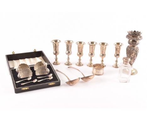 A collection of silver items including: a set of six George V silver Jewish Kiddush cups with engraved decoration, Birmingham