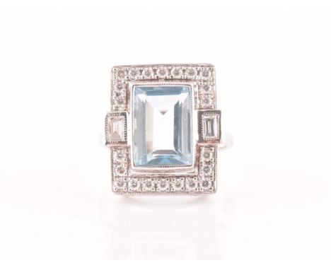 An 18ct white gold, diamond, and aquamarine cocktail ring, set with a mixed rectangular-cut aquamarine of approximately 6.0 c