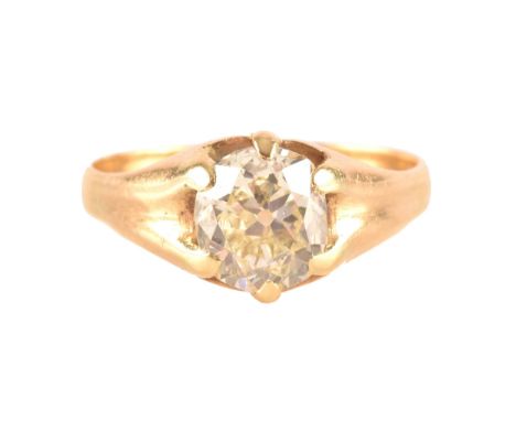 An 18ct yellow gold solitaire diamond ring, set with an old cushion-cut diamond of approximately 2.70 carats, (assessed in mo