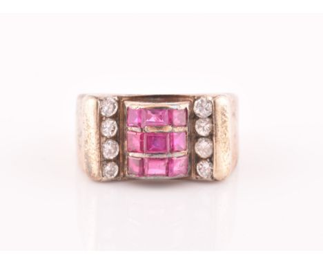 A 1940s ruby and diamond cocktail ring, the raised mount inset with nine mixed square-cut rubies, with a row of four round-cu