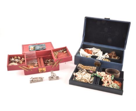 A group of costume jewellery items to include various paste necklaces, coral beaded pieces, various earrings, a gilt metal cu