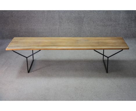 A mid century vintage Heal's hall bench with beech slatted seat on metal frame. Comes with original Heal's invoice. H.39 w.16